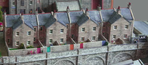 Row of eight terraced houses.