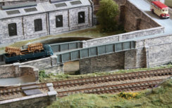 The approach road to the station passes over the entrance to the sidings.